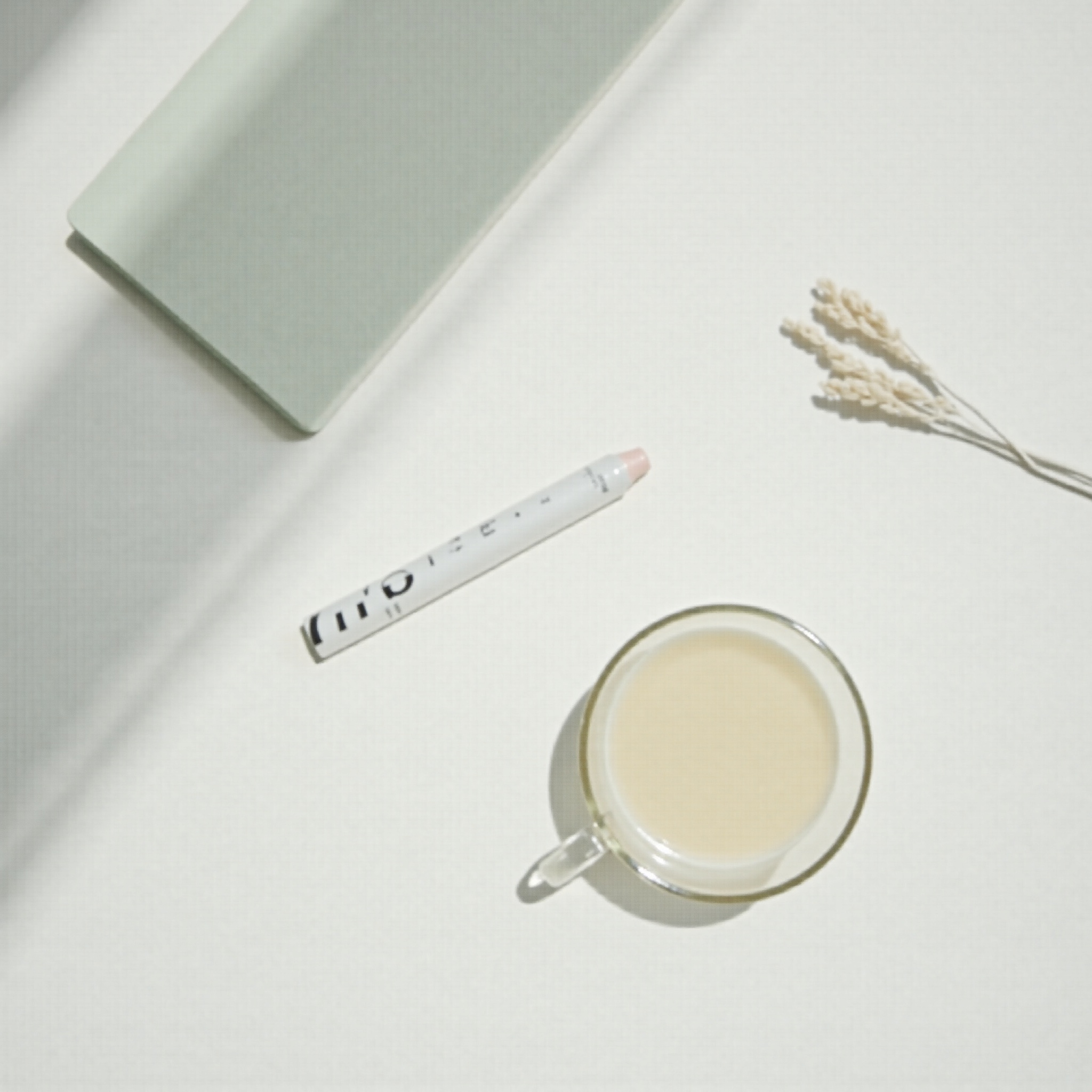 Organised desk with folders and tea